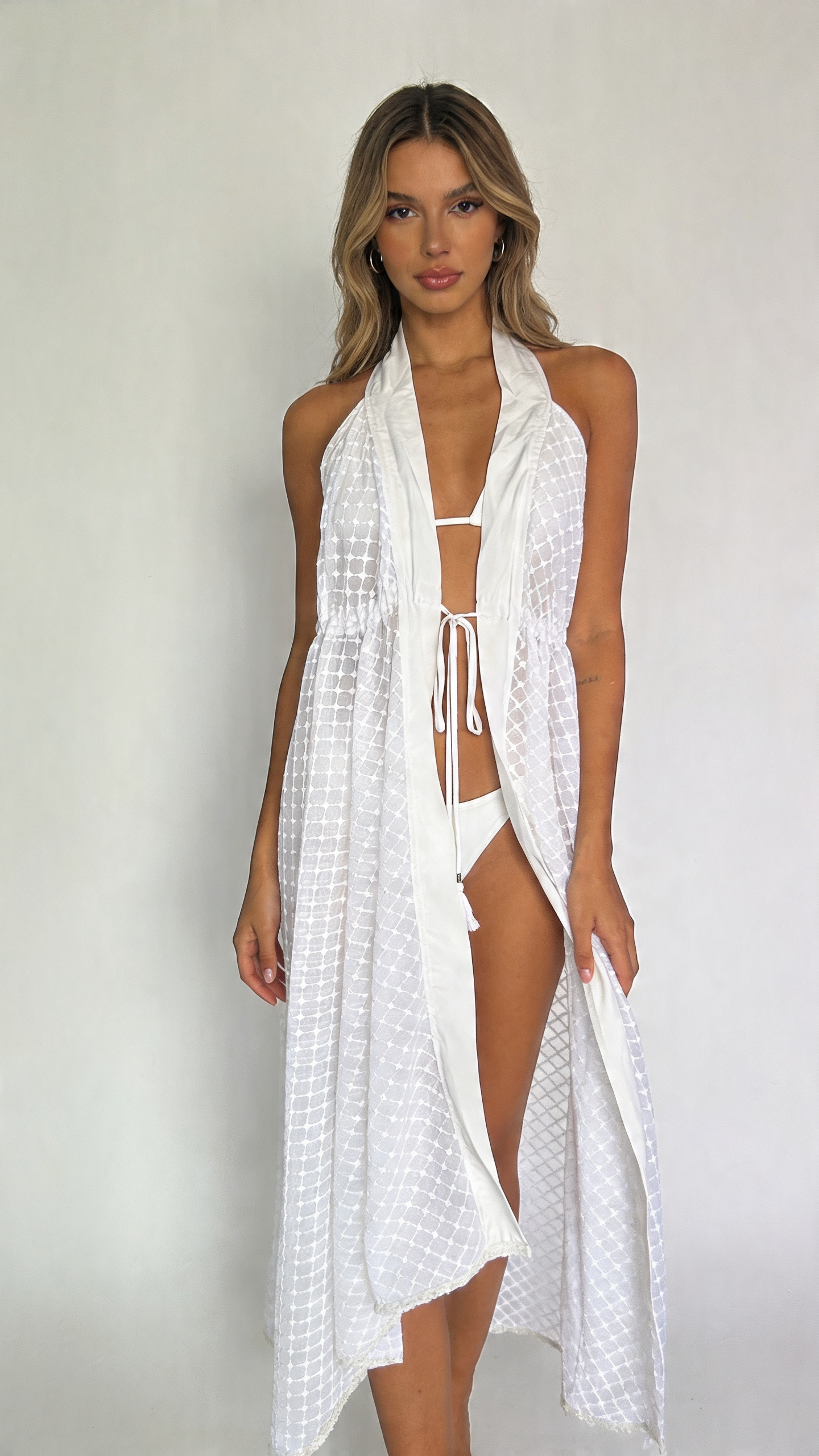 Copricostume pizzo